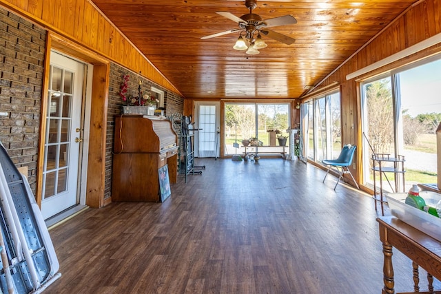 unfurnished sunroom with lofted ceiling, ceiling fan, and wooden ceiling