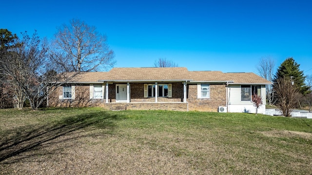 single story home with a front yard