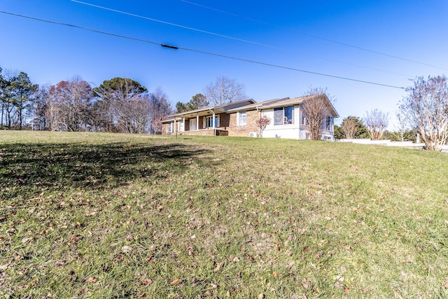 view of front of home with a front lawn