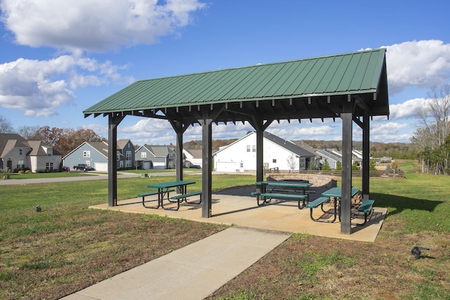 surrounding community featuring a gazebo and a yard