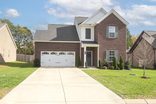 view of front of house featuring a front yard and a garage