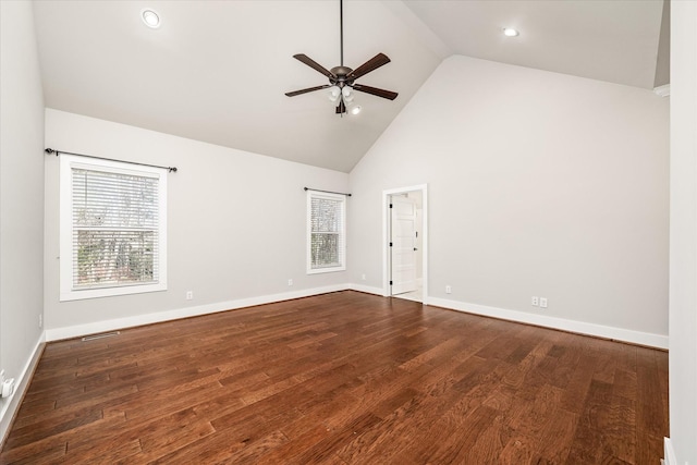 unfurnished room with high vaulted ceiling, ceiling fan, and dark wood-type flooring