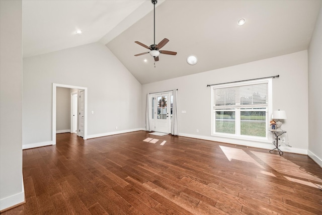 unfurnished living room with dark hardwood / wood-style flooring, high vaulted ceiling, and ceiling fan