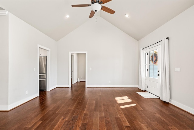 interior space featuring dark hardwood / wood-style floors, high vaulted ceiling, and ceiling fan