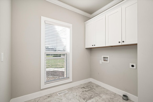 washroom with washer hookup, electric dryer hookup, cabinets, and ornamental molding