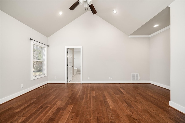 empty room featuring beam ceiling, dark hardwood / wood-style floors, high vaulted ceiling, and ceiling fan