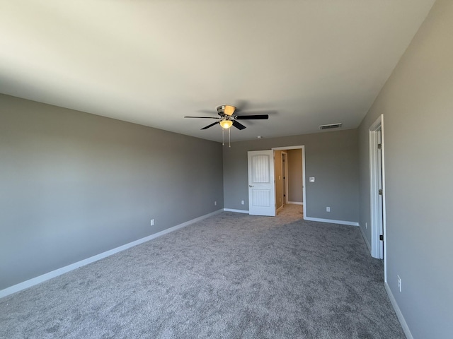 unfurnished bedroom featuring ceiling fan and carpet