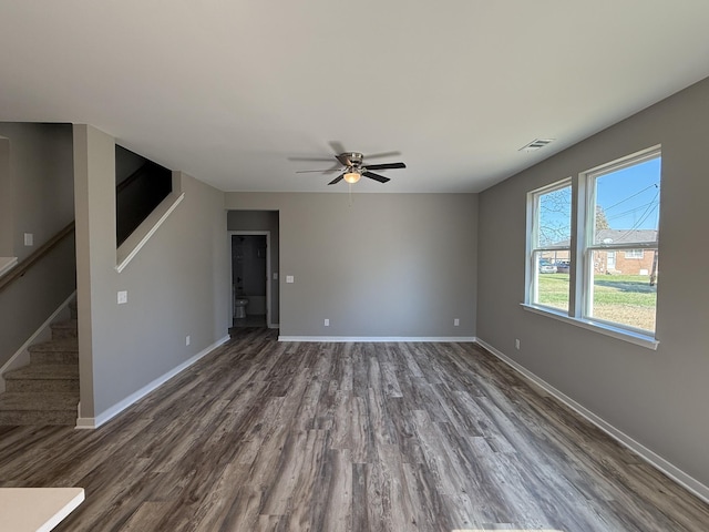 unfurnished living room with hardwood / wood-style floors and ceiling fan