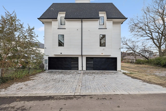 view of home's exterior with a garage