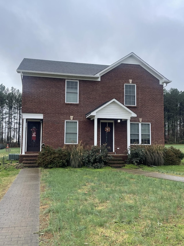 view of front facade featuring a front yard