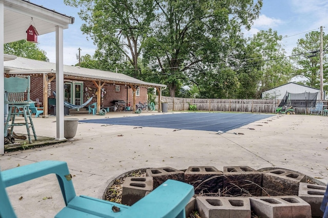 view of pool featuring a patio