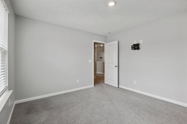 empty room with carpet floors