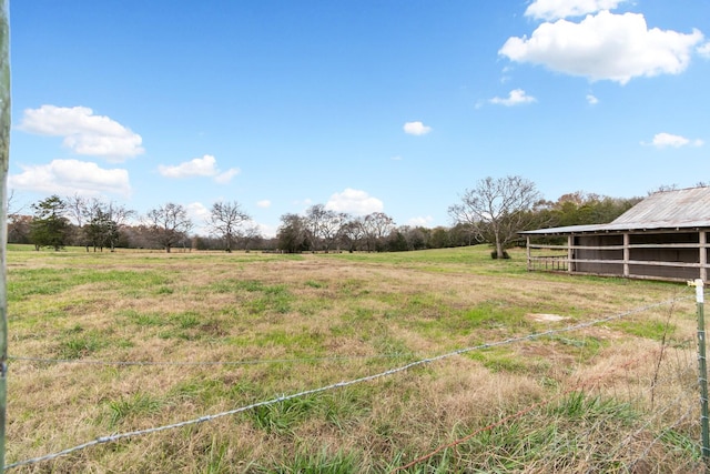 view of yard featuring a rural view