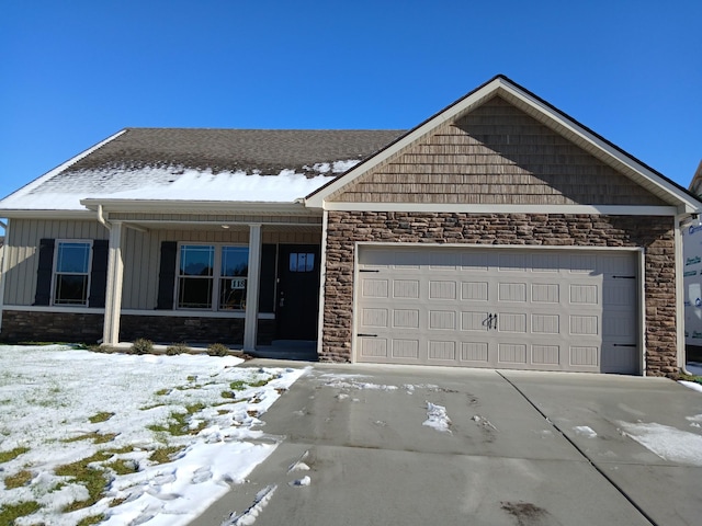 view of front of property with a garage