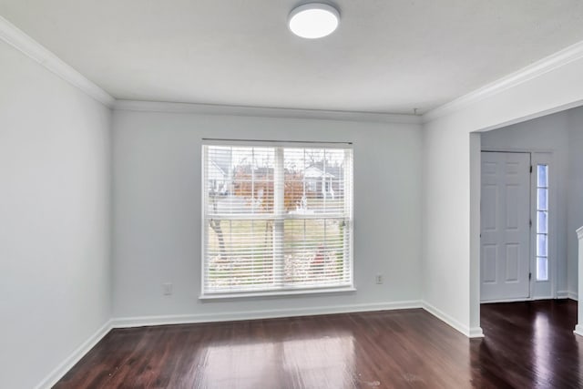 unfurnished room featuring dark hardwood / wood-style flooring and crown molding