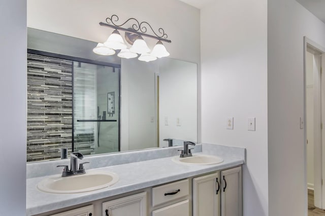 bathroom with vanity and an enclosed shower