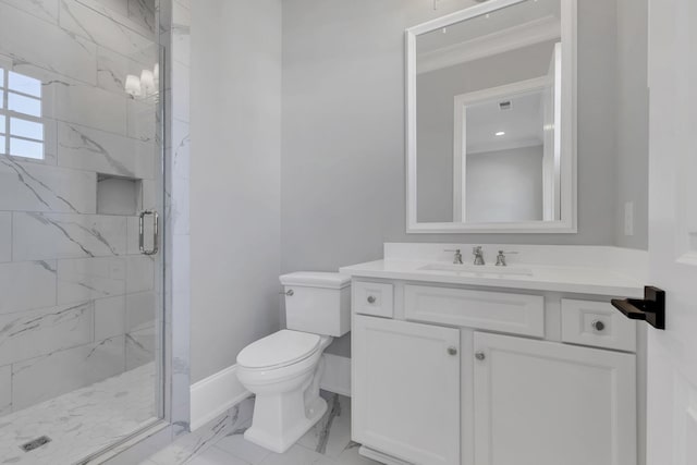 bathroom with vanity, toilet, and a shower with shower door