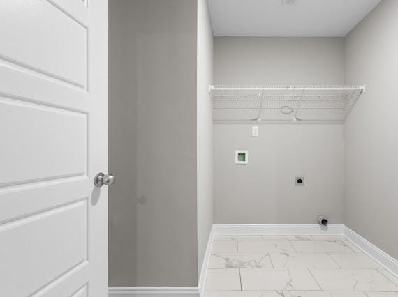 laundry room featuring electric dryer hookup and washer hookup