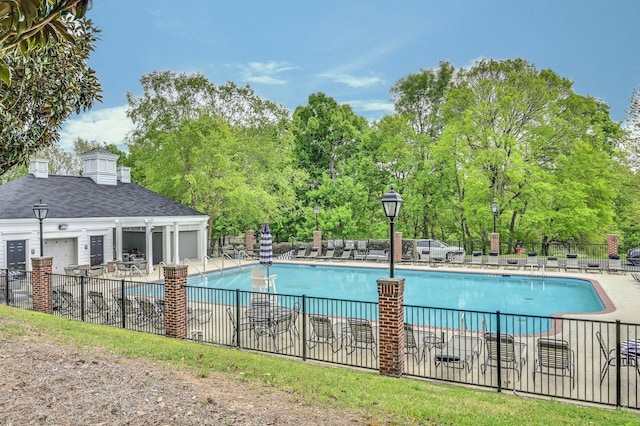 view of pool featuring a patio area