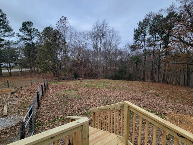 view of yard featuring a wooden deck