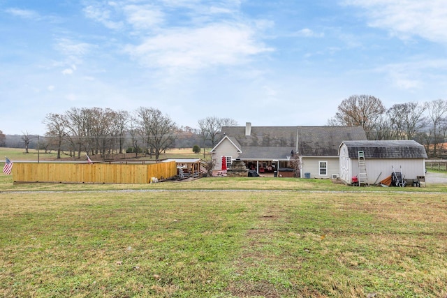 exterior space with a shed