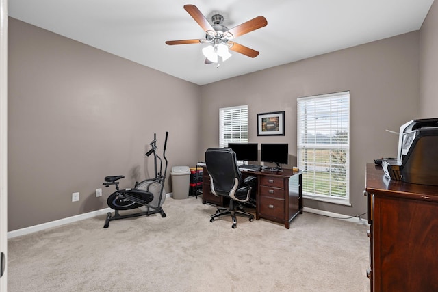 office featuring ceiling fan and light colored carpet