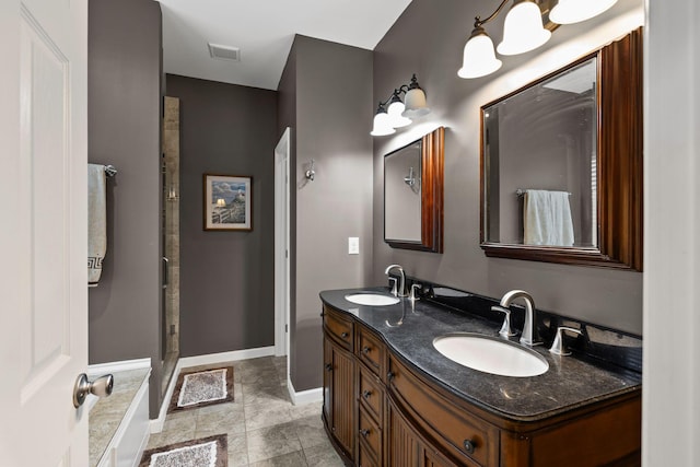 bathroom with a shower and vanity