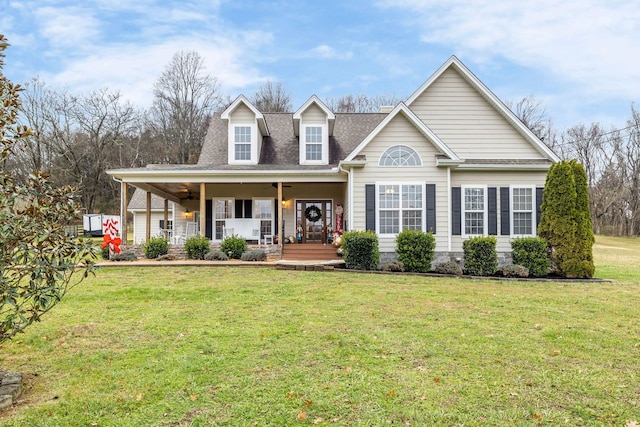 view of front of house featuring covered porch and a front lawn