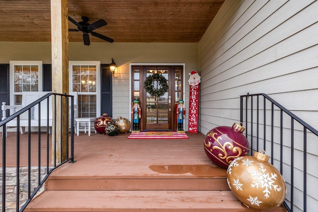 entrance to property featuring ceiling fan and a porch