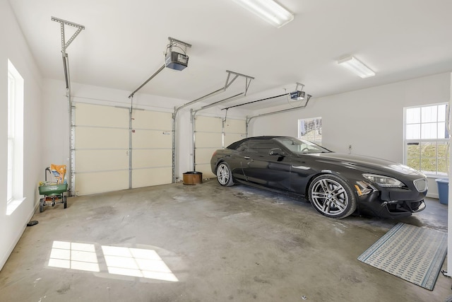 garage featuring a garage door opener