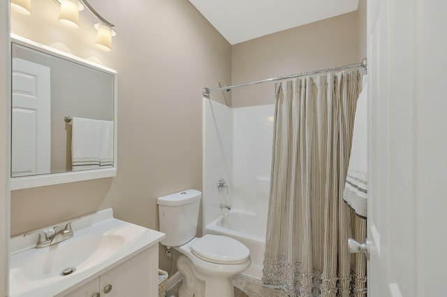 bathroom featuring shower / tub combo, vanity, and toilet