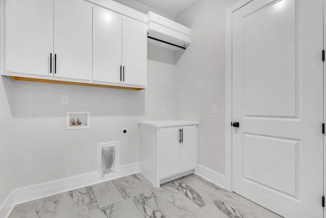 521 Matthew Miller Dr, Smyrna, TN 37167 - laundry area with light marble finish floors, electric dryer hookup, washer hookup, and cabinet space