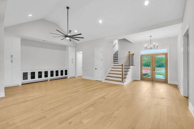 521 Matthew Miller Dr, Smyrna, TN 37167 - unfurnished living room featuring french doors, a chandelier, stairs, light wood-type flooring, and recessed lighting