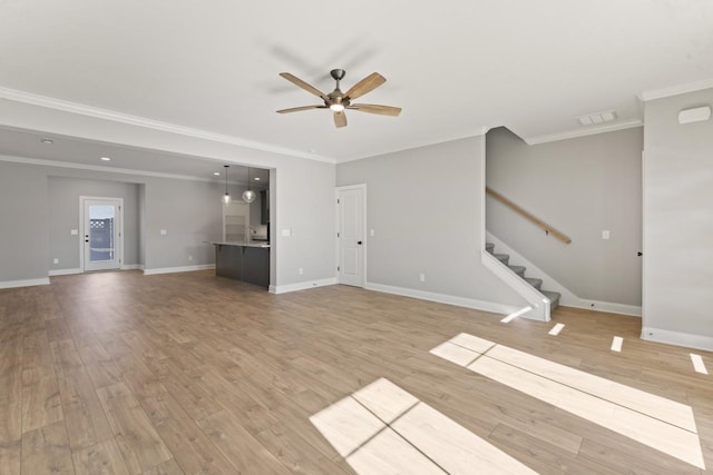 unfurnished living room with light hardwood / wood-style flooring and ornamental molding