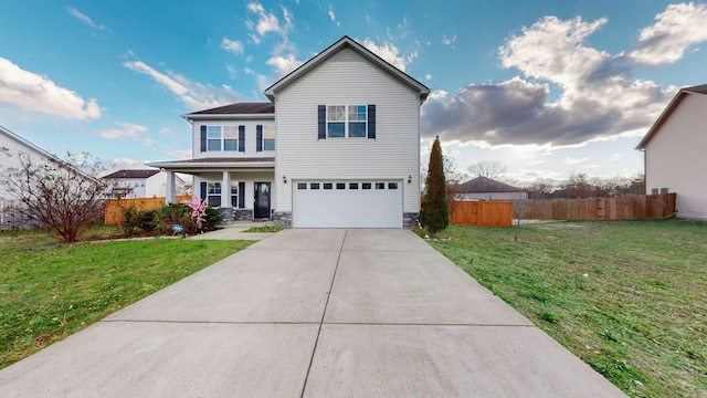 front facade with a porch, a garage, and a front yard