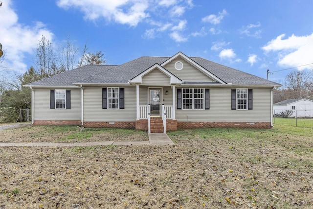 single story home featuring a front yard