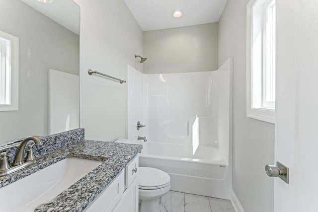 full bathroom featuring vanity, shower / bath combination, and toilet