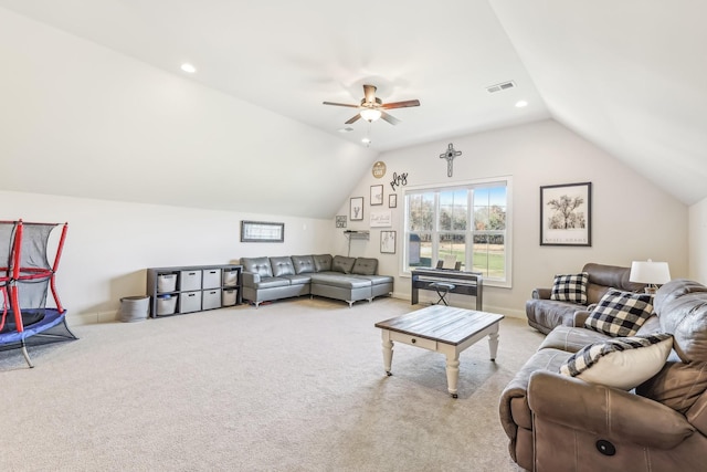 living room with light carpet, ceiling fan, and lofted ceiling