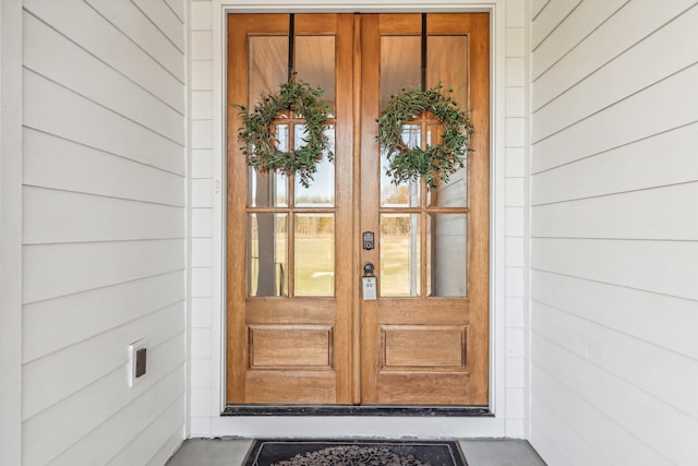 property entrance featuring french doors