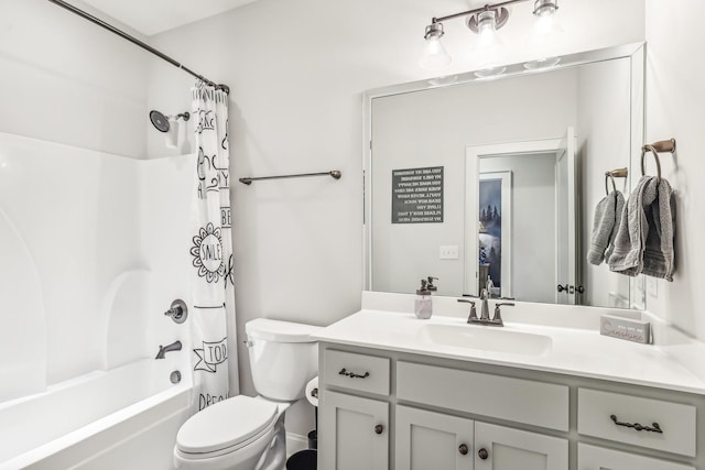 full bathroom featuring vanity, toilet, and shower / tub combo with curtain