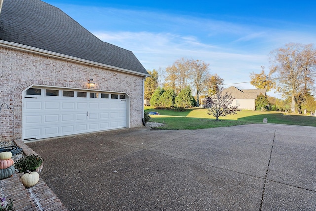 garage with a lawn