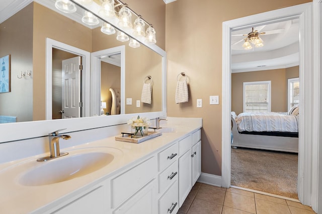 bathroom featuring ceiling fan, tile patterned flooring, vanity, and ornamental molding