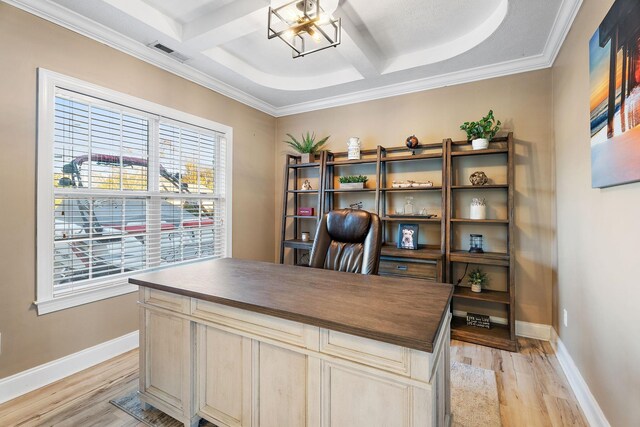 office with beamed ceiling, ornamental molding, coffered ceiling, and light wood-type flooring