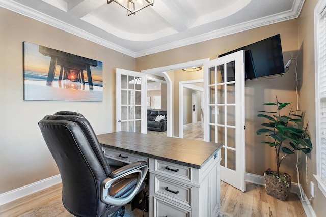 home office with light wood-type flooring and french doors