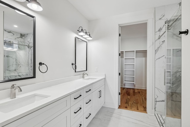 bathroom featuring vanity and walk in shower