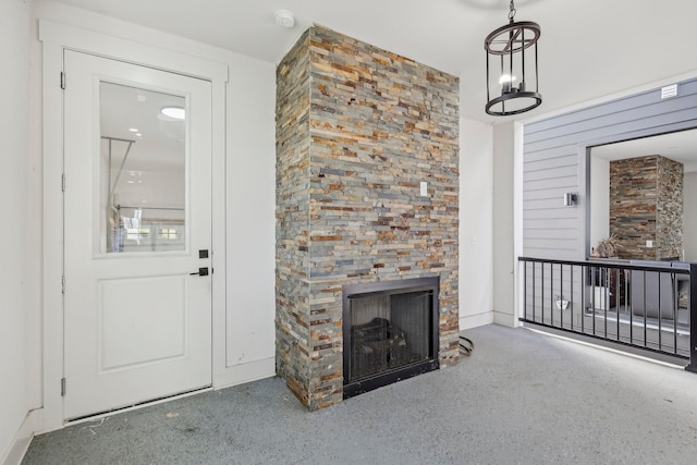 unfurnished living room featuring a fireplace