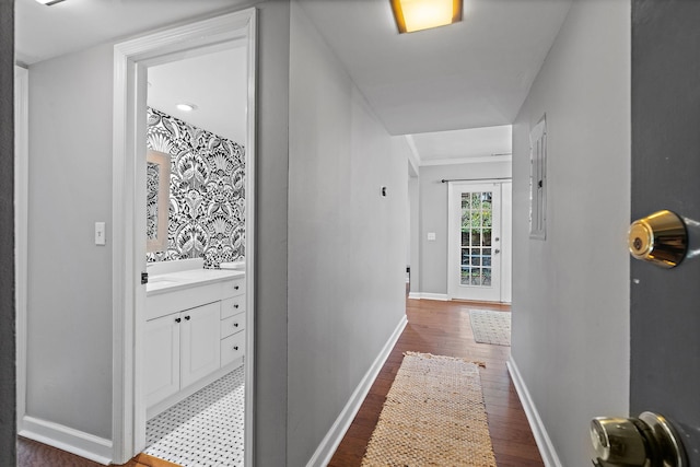 hall with dark hardwood / wood-style flooring