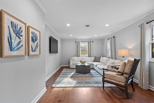 living room featuring ornamental molding and dark wood-type flooring