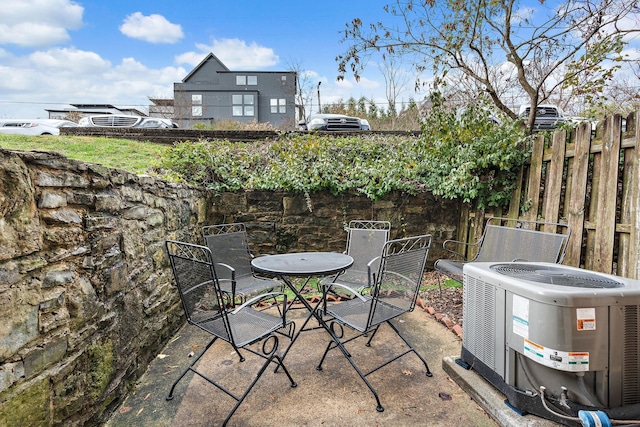 view of patio featuring cooling unit