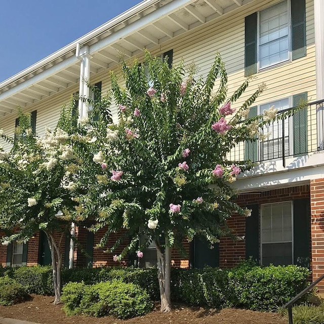 view of property exterior with a balcony